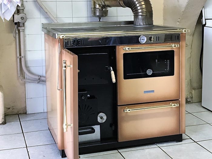 BIGEARD EURL : Installation cuisinière bois bûche Morvan par un installateur RGE qualiBois pour le chauffage central d'une maison