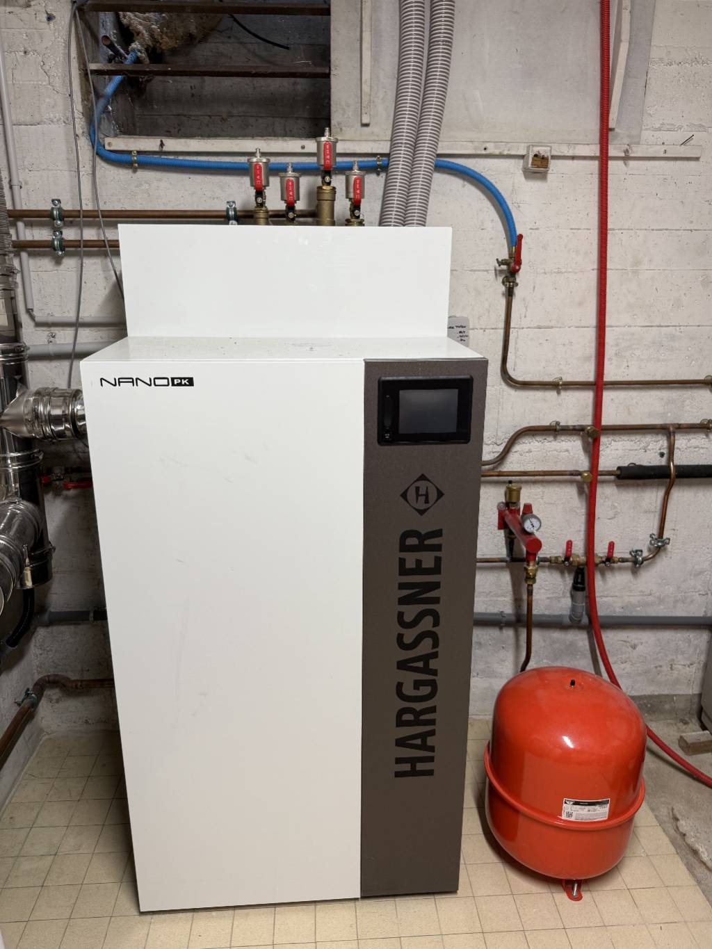 Remplacement d'une chaudière gaz par une chaudière à granulé de bois Hargassner, dans le cadre d'une rénovation globale-Rhône (69)