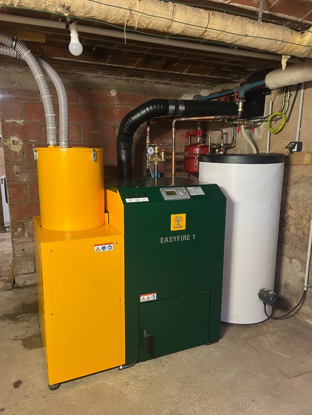 Installation d'une chaudiére à granulés de bois  de la Marque : KWB Modéle : EASYFIRE 1 USP GS15 - Entreprise RGE Qualibois 7*