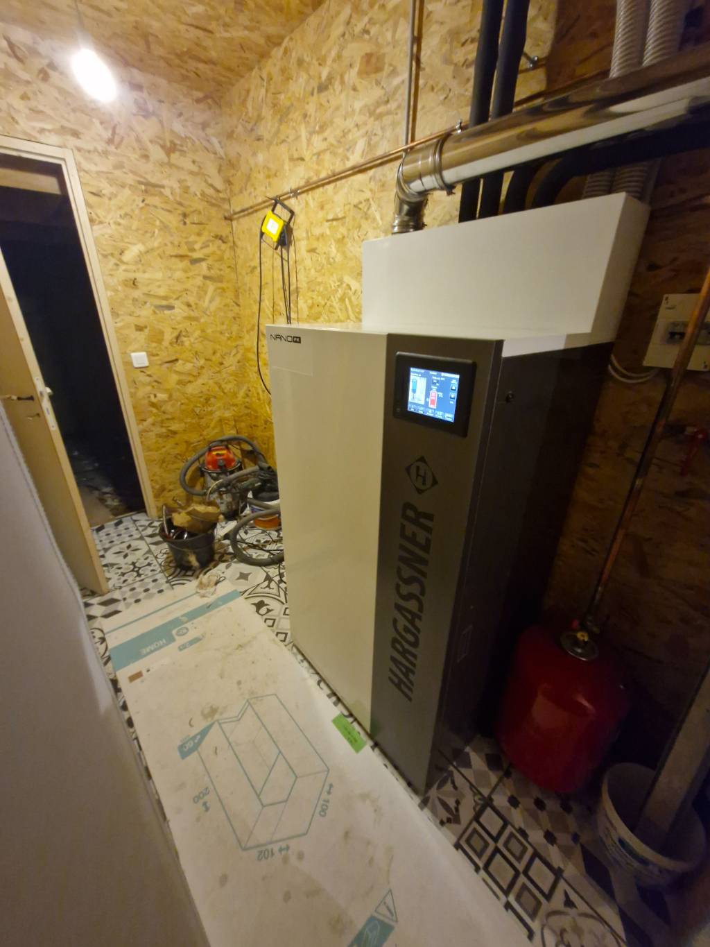 Installation d’une chaudière à granulés Hargassner Nano PK 9