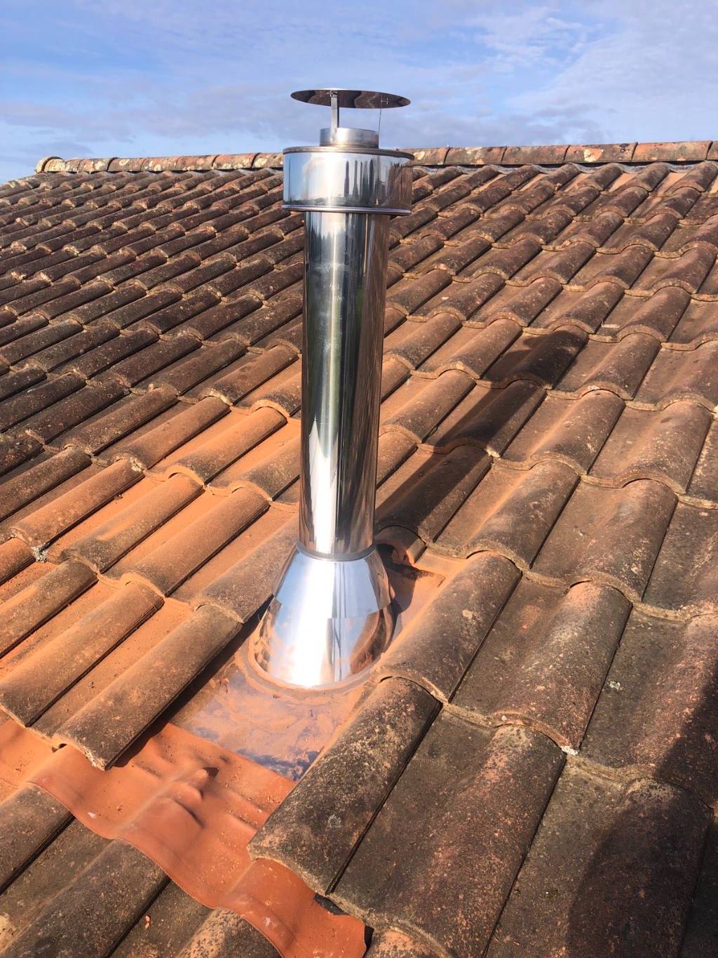 Installation d’un Poêle Nobis Round A8 Complément du Chauffage Électrique