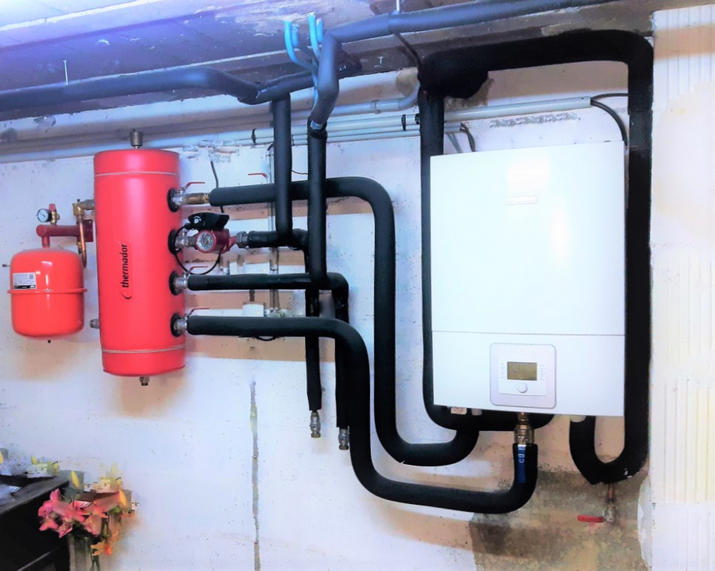 pose d'un chauffage avec pompe à chaleur bosch air eau sur une installation radiateur 
