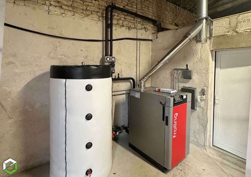 installation d'une chaudière à bois bûches froling - entreprise rge