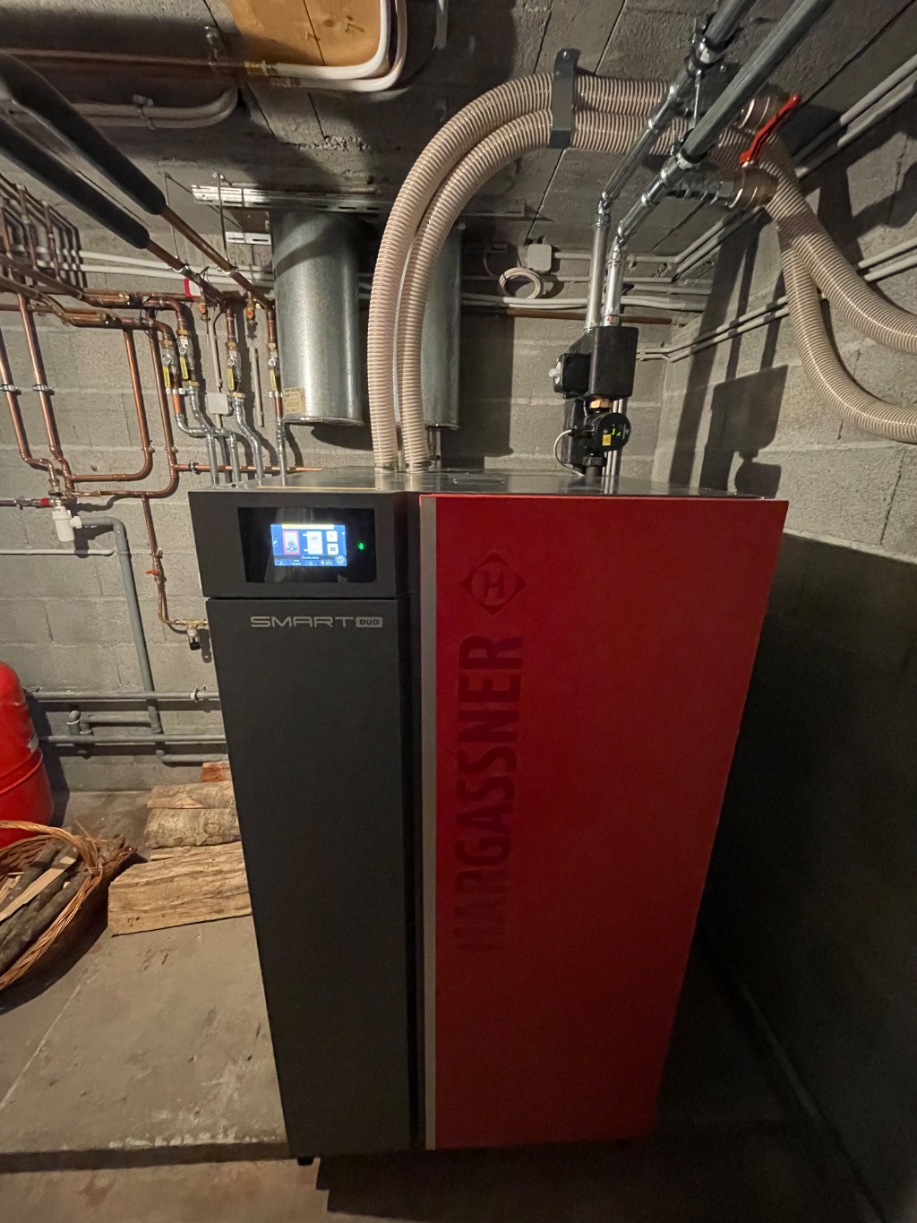 Remplacement d'une chaudière fioul par une chaudière bûches/granulés HARGASSNER SMART DUO 20 kW