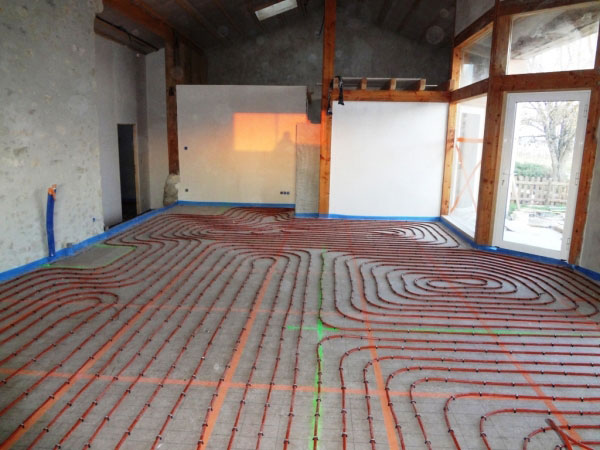 pose plancher chauffant sur dalle isolante pour le chauffage par le sol